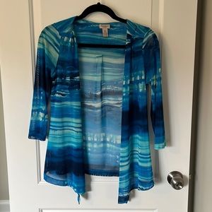 Chico’s sheer cardigan. Machine wash cold, looks new. 3/4 length sleeves.